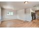 Inviting living space with hardwood floors and bright recessed lighting at 4804 N Raleigh St, Denver, CO 80212