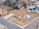 Aerial shot of home with a large front yard, and long driveway at 11241 W 60Th Ave, Arvada, CO 80004