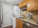 Kitchen area featuring stainless steel appliances, granite counters, and modern sink at 3351 S Field St # 150, Lakewood, CO 80227