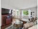 Spacious living room area with lots of seating and natural light at 3351 S Field St # 150, Lakewood, CO 80227