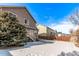 Large backyard with snowy ground and wooden fence at 672 Pitkin Way, Castle Rock, CO 80104