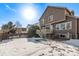 Spacious backyard with patio and deck at 672 Pitkin Way, Castle Rock, CO 80104