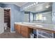 Bathroom with double vanity and separate toilet area at 672 Pitkin Way, Castle Rock, CO 80104