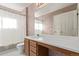 Clean bathroom with wood vanity and single sink at 672 Pitkin Way, Castle Rock, CO 80104