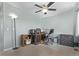 Bedroom with home office setup and ceiling fan at 672 Pitkin Way, Castle Rock, CO 80104