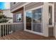 Deck with access to interior via sliding glass door at 672 Pitkin Way, Castle Rock, CO 80104