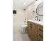 Updated bathroom featuring a modern vanity, tiled shower/tub combo, and sleek fixtures at 4274 S Salida Way # 3, Aurora, CO 80013