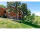 Exterior of building with stone accents and well-maintained lawn at 4274 S Salida Way # 3, Aurora, CO 80013