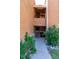 Exterior entrance to unit with stairway and lush landscaping at 4274 S Salida Way # 3, Aurora, CO 80013