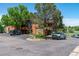 Exterior view of building with mature trees, landscaping and parking at 4274 S Salida Way # 3, Aurora, CO 80013