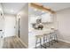 Well-lit kitchen boasts modern fixtures, breakfast bar with seating, and convenient layout at 4274 S Salida Way # 3, Aurora, CO 80013
