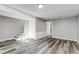 Spacious finished basement with modern flooring, updated paint and convenient stairs at 1244 S Reed St # 2, Lakewood, CO 80232
