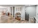 This spacious living room has hardwood floors and features a bar area with a wine rack at 1244 S Reed St # 2, Lakewood, CO 80232