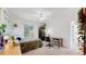 Bright bedroom with a comfortable bed, a desk, and a bookshelf, offering a pleasant and functional living space at 7084 Fox Paw Trl, Littleton, CO 80125