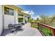 Expansive deck with patio furniture, ideal for outdoor dining and entertaining at 7084 Fox Paw Trl, Littleton, CO 80125