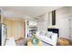 Cozy living room featuring a fireplace, comfortable sofa, and stylish decor at 8701 Huron St # 1-207, Thornton, CO 80260