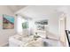 Inviting living room with a comfortable sofa and bright natural light at 8701 Huron St # 1-207, Thornton, CO 80260
