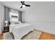 Cozy bedroom with a neutral color palette and plush bedding for ultimate relaxation at 1939 S Sherman St, Denver, CO 80210