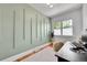 Stylish office with a contemporary accent wall and natural light at 1939 S Sherman St, Denver, CO 80210