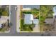 Aerial view of the home and property, outlined in yellow, showcasing yard and location at 6895 E 74Th Ave, Commerce City, CO 80022