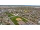 Aerial view of property in neighborhood, with yellow arrow indicating its location at 6895 E 74Th Ave, Commerce City, CO 80022