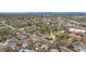 Aerial view of a residential neighborhood with tree-lined streets and well-maintained homes at 6895 E 74Th Ave, Commerce City, CO 80022