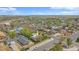Aerial view of home with a yellow arrow, set in a neighborhood with easy access to amenities at 6895 E 74Th Ave, Commerce City, CO 80022