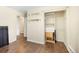 Image shows a small apartment with hardwood floors and shelves and closet at 6895 E 74Th Ave, Commerce City, CO 80022
