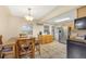 Eat-in kitchen features tile floors, stainless steel appliances, and wooden cabinets at 6895 E 74Th Ave, Commerce City, CO 80022