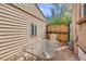 Cozy patio area with outdoor seating, perfect for relaxing and enjoying the backyard at 6895 E 74Th Ave, Commerce City, CO 80022