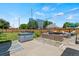 Backyard features an outdoor seating area, patio, hot tub, green lawn and wood fence at 1390 Emporia St, Aurora, CO 80010