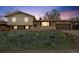 Charming two-story home with brick and vinyl siding, inviting curb appeal, and an attached two car garage at 12931 E 46Th Ave, Denver, CO 80239