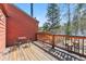 Balcony with seating overlooking wooded area at 876 Broken Lance Dr, Breckenridge, CO 80424