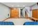 Finished basement with closet, stairs, and walkout at 876 Broken Lance Dr, Breckenridge, CO 80424