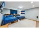 This bedroom features 2 beds, a television, the Colorado flag, and carpeted floors at 876 Broken Lance Dr, Breckenridge, CO 80424