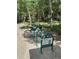 Bike rack with bikes in a wooded area provides convenient and eco-friendly transportation options for residents at 876 Broken Lance Dr, Breckenridge, CO 80424