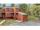 Exterior features a multi-level townhouse with parking and stairs leading to the entrance at 876 Broken Lance Dr, Breckenridge, CO 80424