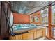 Hot tub on an outdoor patio, fully covered, with room to relax and enjoy the outdoors at 876 Broken Lance Dr, Breckenridge, CO 80424