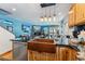Modern kitchen featuring a copper sink, stainless steel appliances, and stylish pendant lighting at 876 Broken Lance Dr, Breckenridge, CO 80424