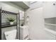 Compact bathroom featuring modern fixtures, including a sleek vanity and space-saving storage solutions at 7625 Turner Dr, Denver, CO 80221