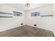 Well-lit bedroom with hardwood floors, providing a clean and inviting space for rest and relaxation at 7625 Turner Dr, Denver, CO 80221