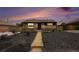 Charming brick home with updated landscaping and a walkway leading to the front door at 7625 Turner Dr, Denver, CO 80221