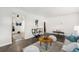 Bright living room with hardwood floors, modern decor, and an open layout at 7625 Turner Dr, Denver, CO 80221