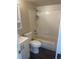 Clean bathroom with a tub, shower, and white vanity at 4316 N Malta St, Denver, CO 80249