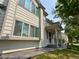 Two-story house with light beige siding and landscaping at 4316 N Malta St, Denver, CO 80249