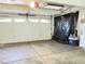 Attached garage with an automatic garage door opener at 4316 N Malta St, Denver, CO 80249