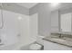 Bathroom featuring a shower and tub combination and a granite countertop sink at 195 S Sable Blvd # U12, Aurora, CO 80012