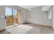Bedroom with sliding glass door for outdoor access, neutral carpet and natural light at 195 S Sable Blvd # U12, Aurora, CO 80012