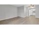 Bright living room with laminate floors and neutral color scheme at 195 S Sable Blvd # U12, Aurora, CO 80012