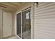 Patio with sliding glass door and an adjacent storage closet on a wood-sided building at 195 S Sable Blvd # U12, Aurora, CO 80012
